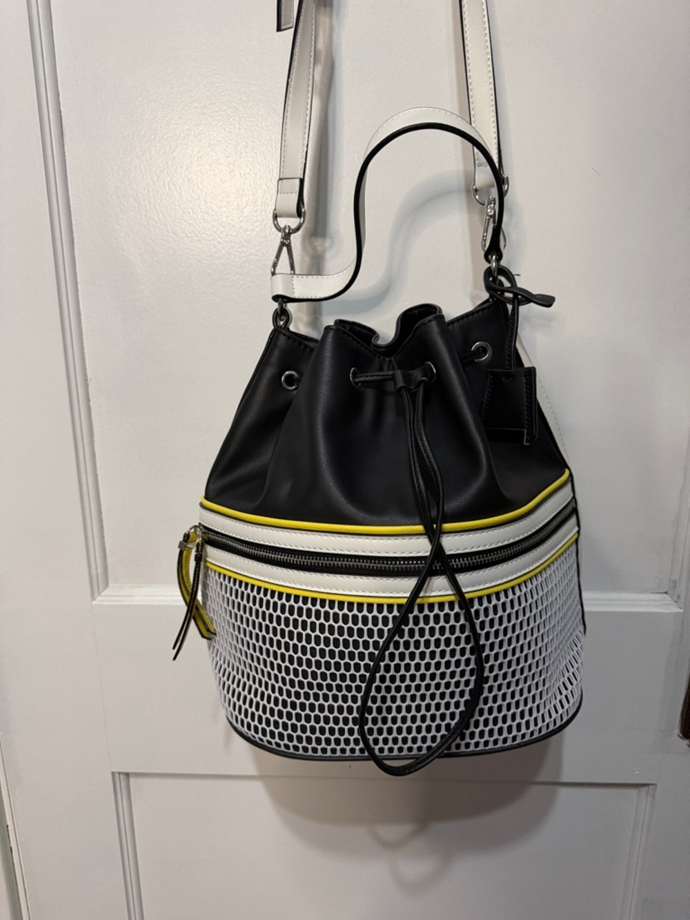 Nine West Black and White Drawstring Bucket Bag with Yellow Trim.